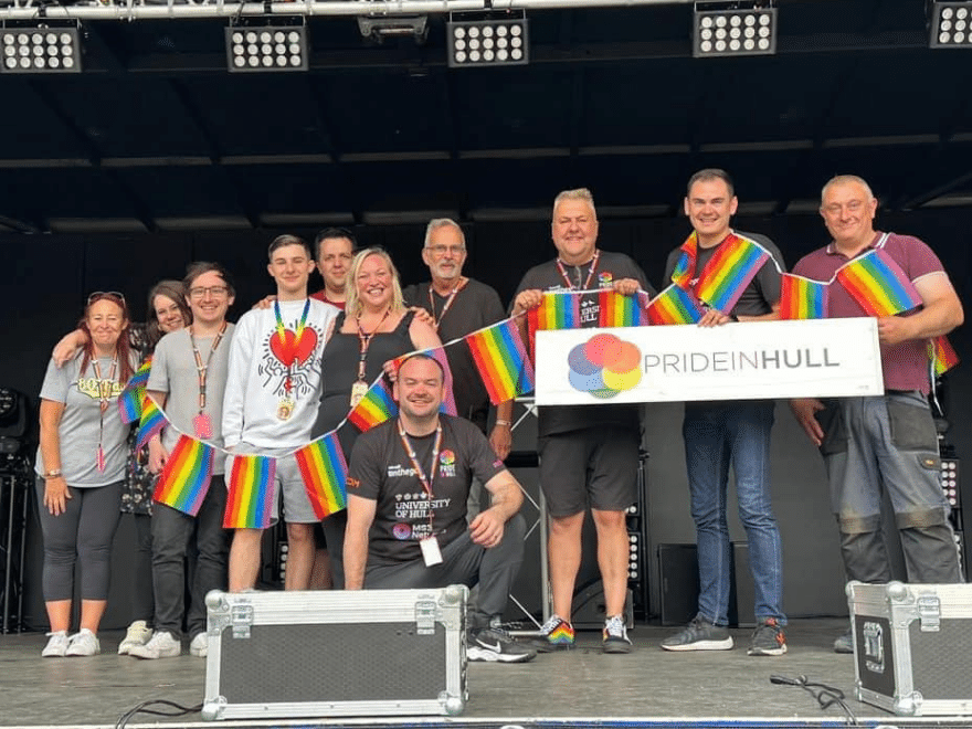 the one point logo besides pride in hull logo